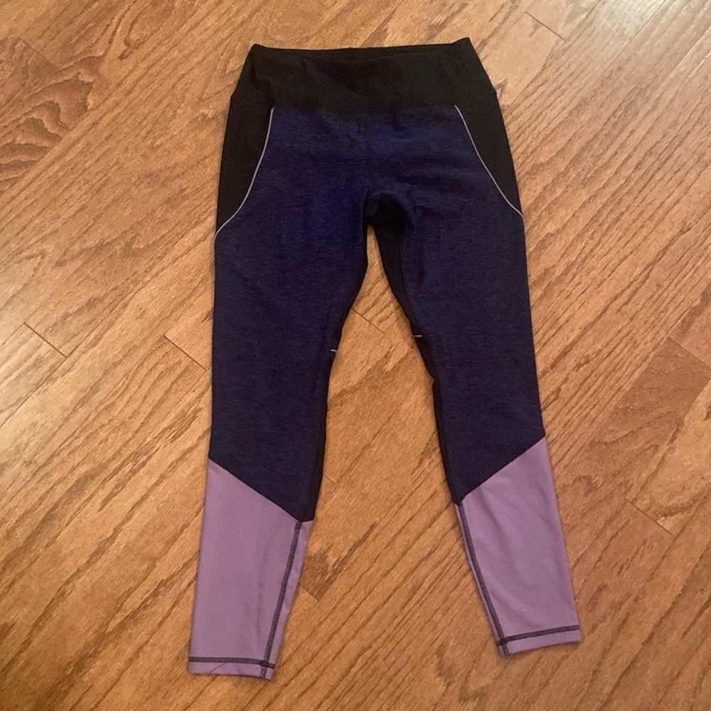 Reebok size medium leggings, blue, black, and purple, really cute